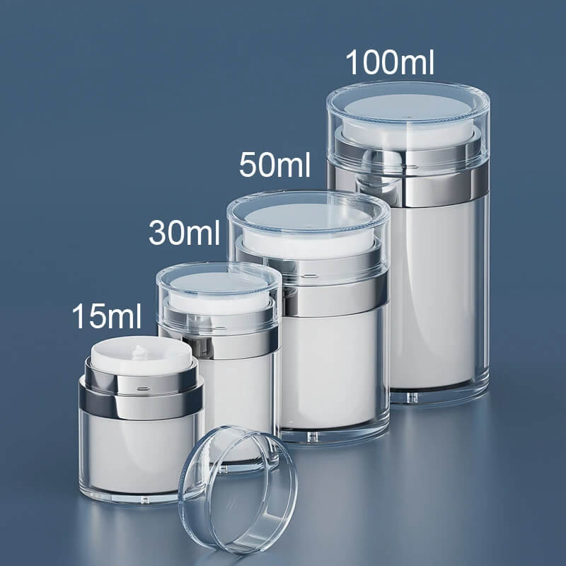 Set of clear cosmetic jars with silver lids on a dark blue background