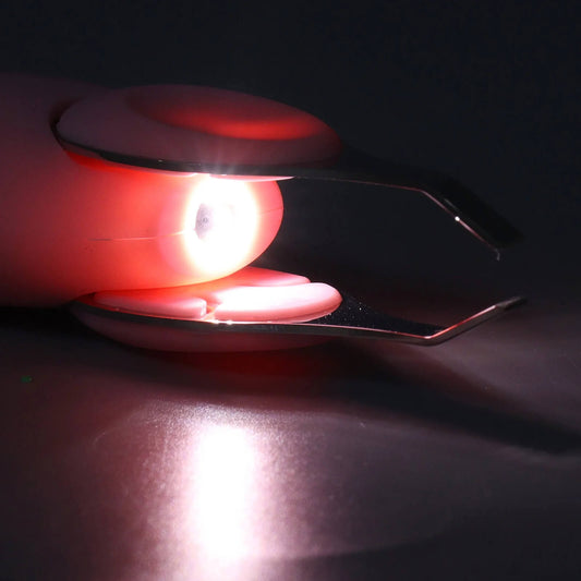 Red light-emitting device on a dark background