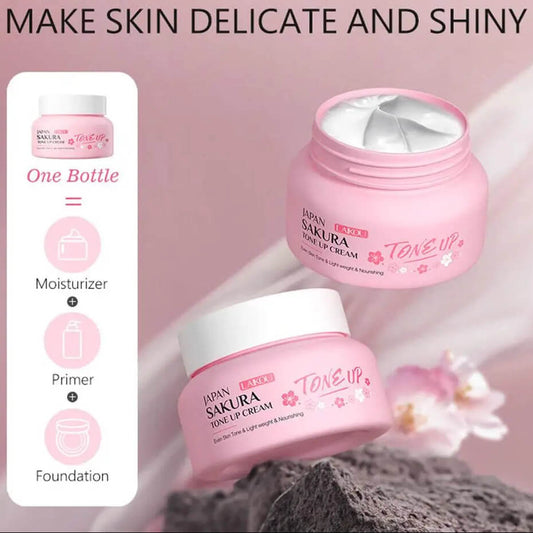 Two pink jars of Sakura Tone Up cream with a pink background and text about skin care benefits.