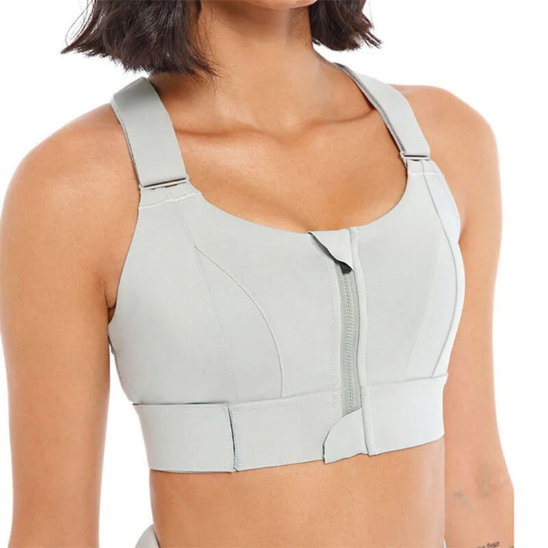 Ice gray sports bra with a zipper on a white background