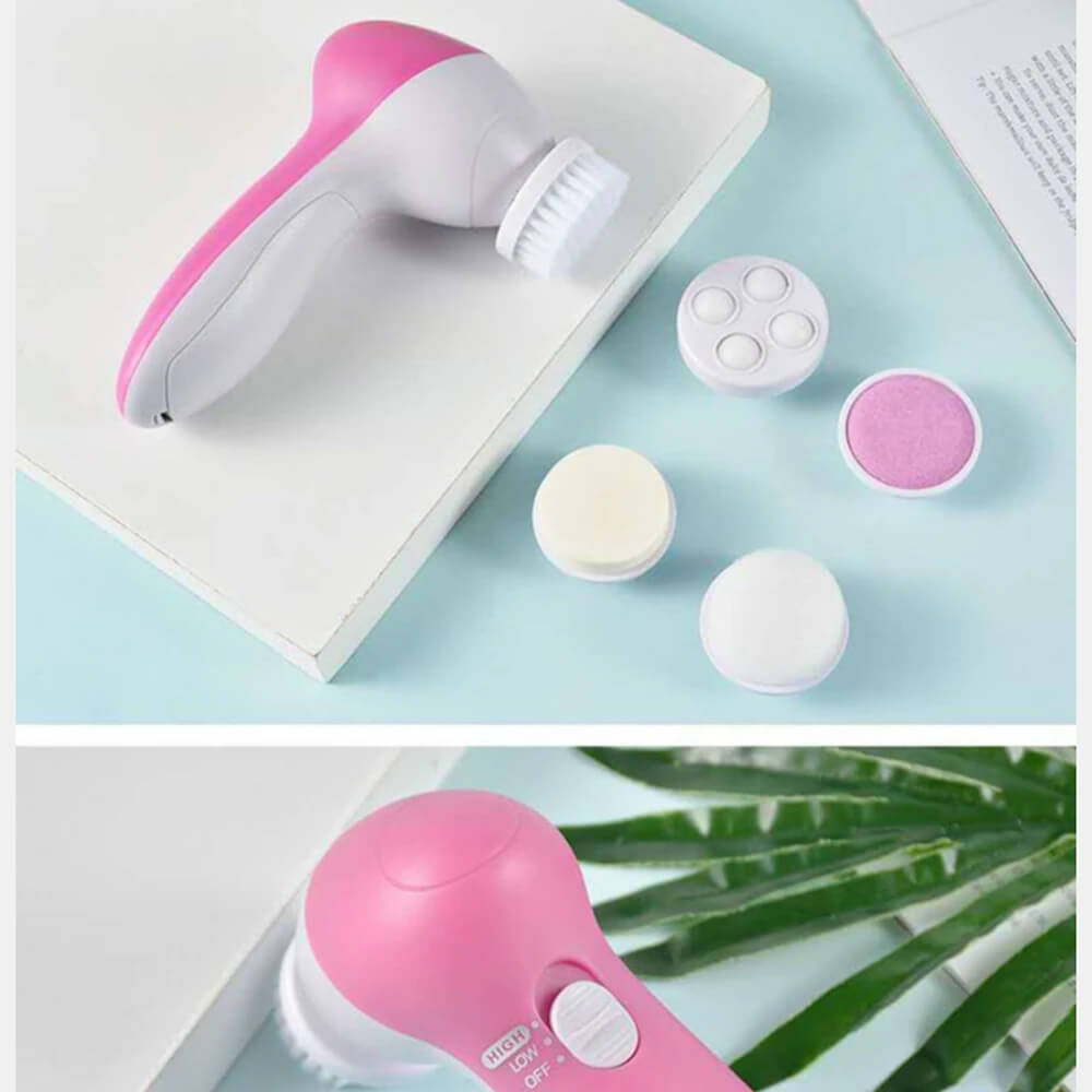 Pink and white facial cleansing brush with attachments on a light blue background