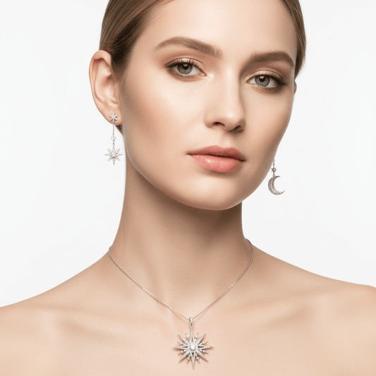 Woman wearing silver star-shaped earrings and necklace on a white background