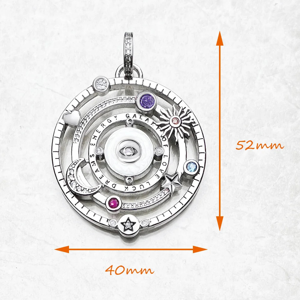 Silver pendant with gemstones and measurements on a white background