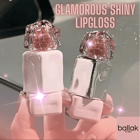 Two diamond-shaped lip glosses held by a hand with glittery text 'GLAMOROUS SHINY LIPGLOSS' and brand 'ballak' visible.