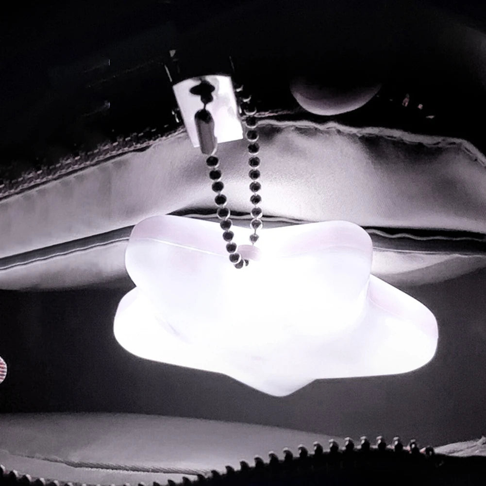 Car ceiling light with a pull chain on a car interior background