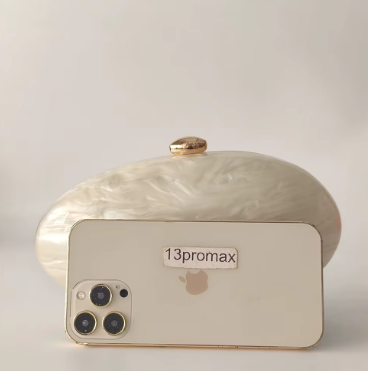 Phone case with '13promax' branding on a beige background